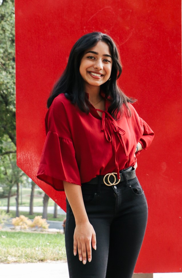 A photo of Sanila Math, she smiles and looks at the camera.